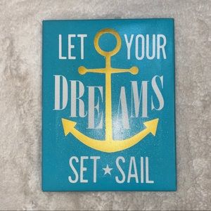 “Let your dreams set sail” wall decor